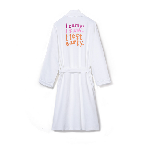 White robe with text in pink and orange that reads "I came, I saw, I left early."